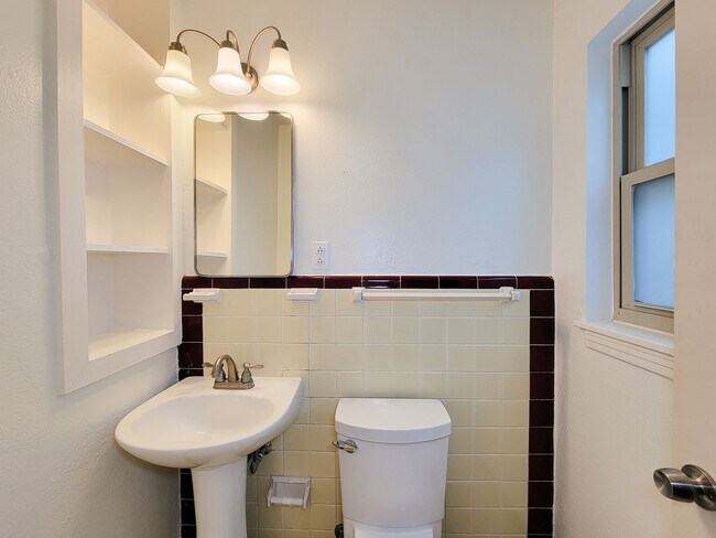 Building Photo - Step into your new home nestled in the vib...