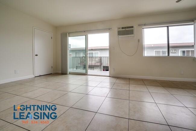 Building Photo - Spacious and Stylish 1-Bedroom with Balcon...