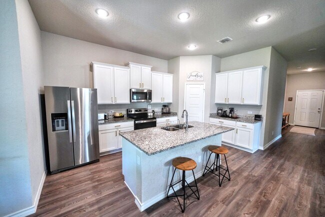 Building Photo - Stunning Home with 3-Car Garage in New Bra...