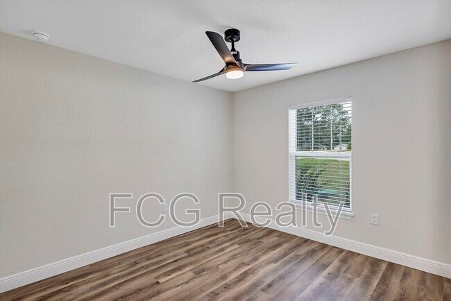 Building Photo - 6551 Hemlock Rd