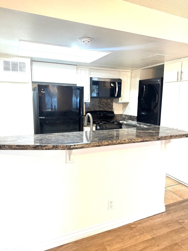 Building Photo - 8463 De Soto Ave