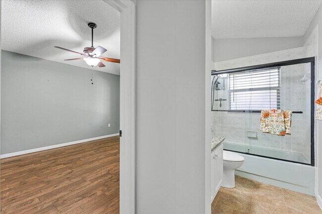 Building Photo - A vibrant 2-bedroom, 2-bathroom tropical retreat designed for both high-energy entertaining and l...