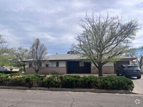 Building Photo - 3 Br, 1.75 Ba, 2 living areas, den with fi...