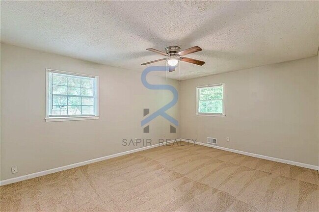 Building Photo - Move in before December 15th and choose your reward: a $250 Amazon Gift Card or a 55" Smart TV!