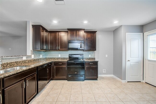 Building Photo - 6222 El Topacio Dr