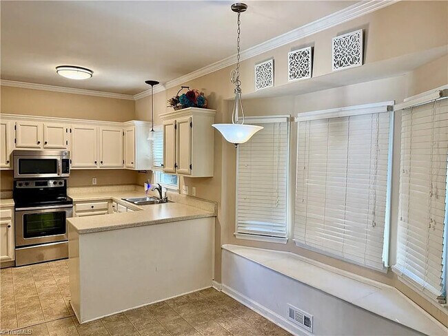Building Photo - Earn Wealth While Leasing - Like a Homeown...