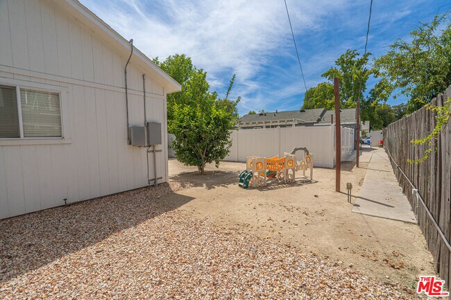 Building Photo - 7044 Garden Grove Ave