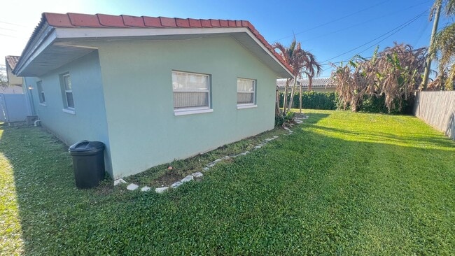 Building Photo - IMMACULATE 4 Bedroom, 2 Bathroom Home in Cocoa Beach!! ONLY MINUTES from the Beach!! (Lawn Care I...