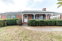 Building Photo - 4 Bedroom || 3 Bathroom Home with Finished...