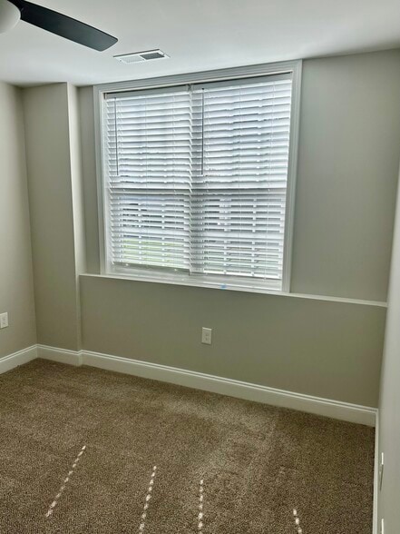 Second bedroom, double window, ceiling fan - 2312-A Belle Ave NE