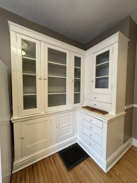 Kitchen complete with built ins for tons of cabinet space. - 1030 N Church St