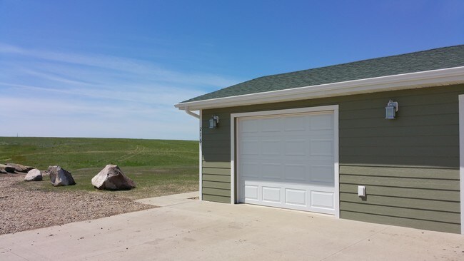 Garage with each Townhome - Prairie Meadows Townhomes