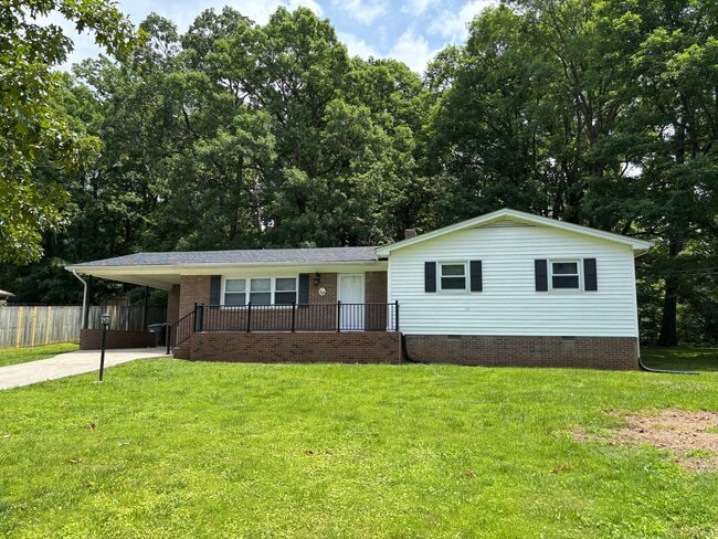 Building Photo - Nice brick home, single carport, storage b...