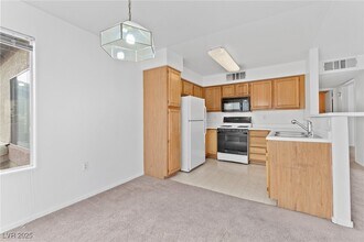 Building Photo - 5710 E Tropicana Ave
