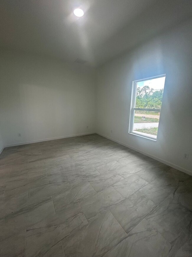 Building Photo - JUST BUILT! Modern 3 Bed / 2 Bath Home with Garage in Serene Lake Placid