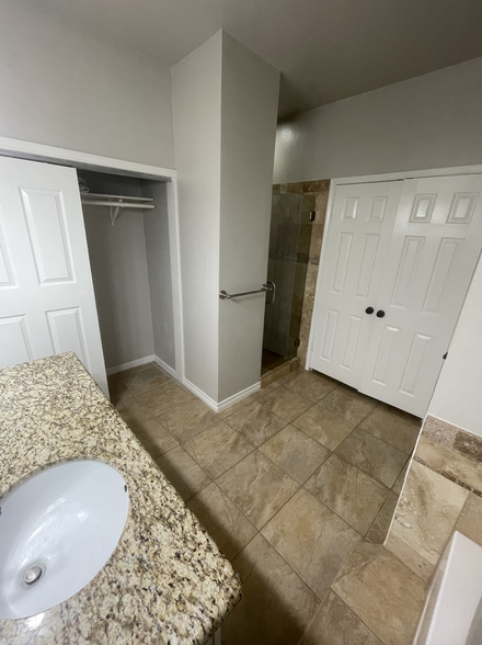 View of the Primary bathroom from the Tub - 6633 Queensclub Dr