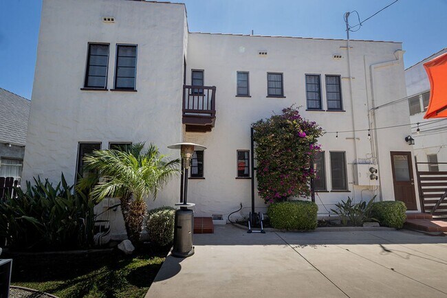 Building Photo - Beautifully Restored 3BR Miracle Mile Duplex | 1,725 SF | Near Metro D Line