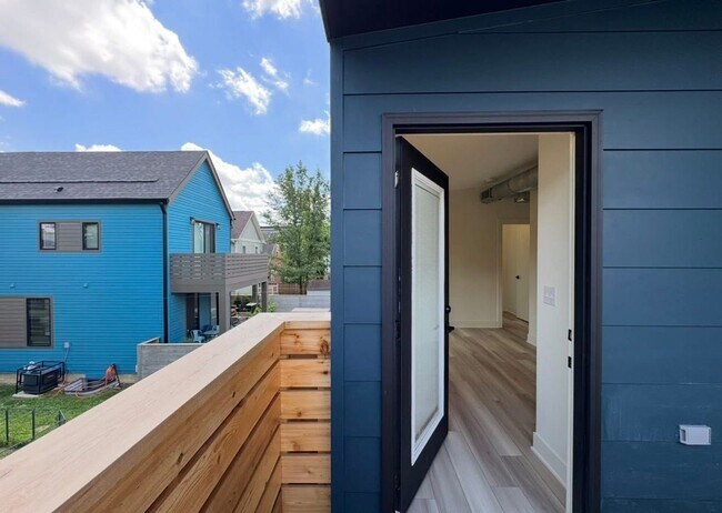 Building Photo - Vaulted Ceilings & Hardwood Floors in This Charming Indianapolis L