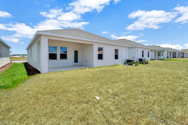 Building Photo - Stunning 4BR Eastham Plan in Pine Glen | Solar Home with Resort-Style Amenities in St. Cloud, FL