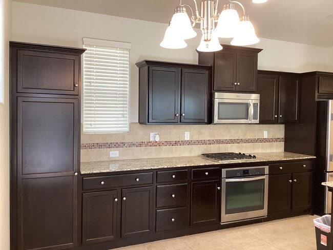 Building Photo - 7009 Harmony Dr