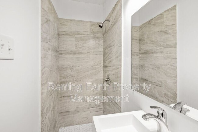 Building Photo - 8215 Rugby Ave