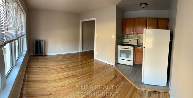 Building Photo - 5662 N Ridge Ave