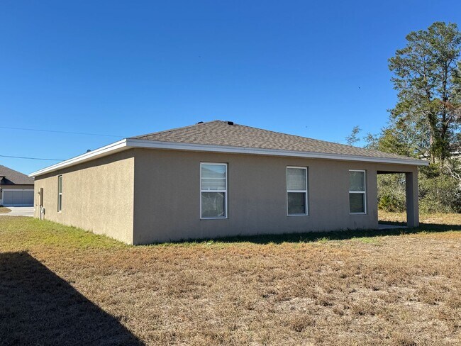 Building Photo - BEAUTIFUL, 4 bedroom, 2 bathroom Home in Poinciana!! Cable & Internet Included with Rent!!