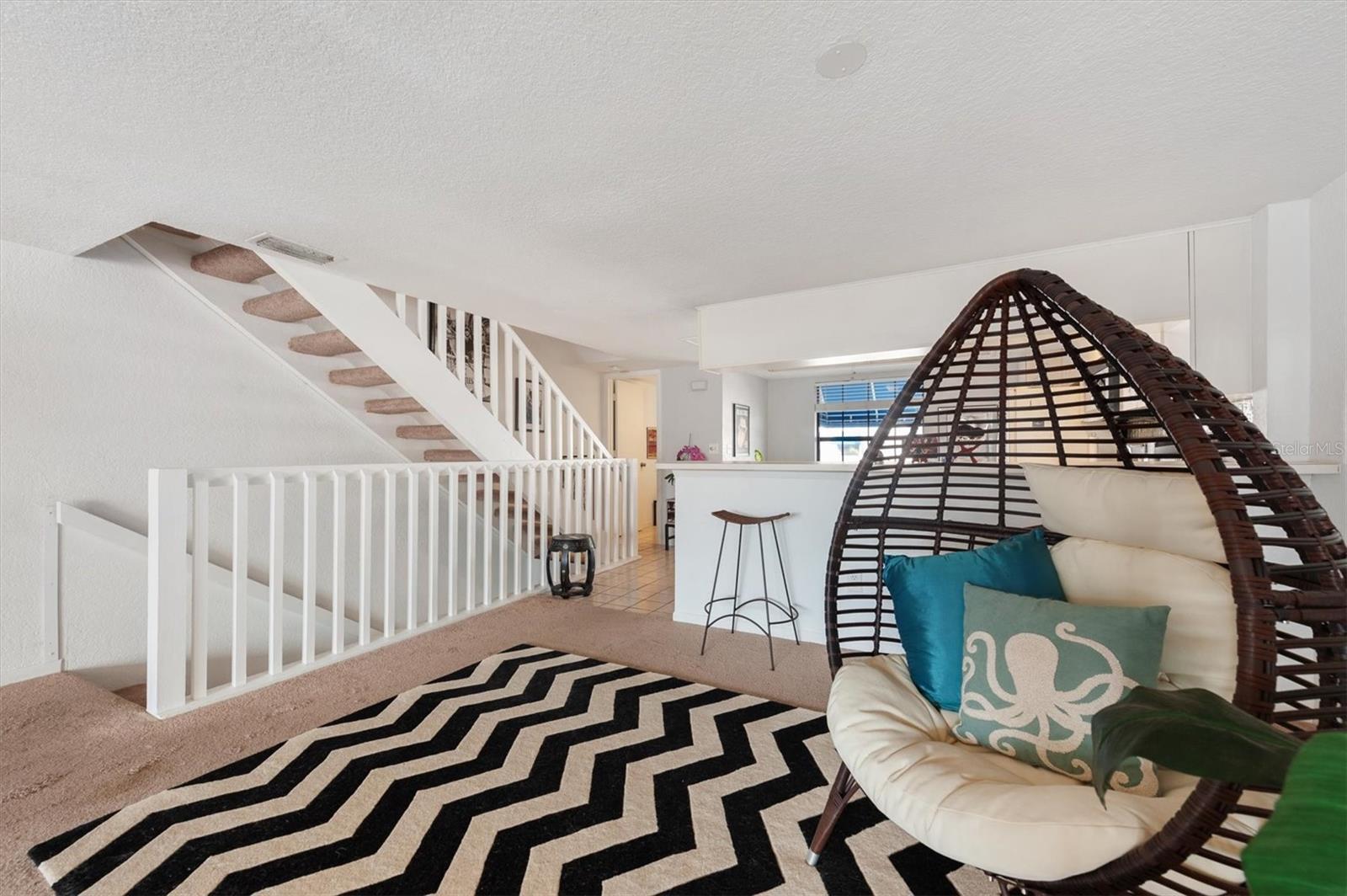 livering room facing stairs - 745 Pinellas Bayway S