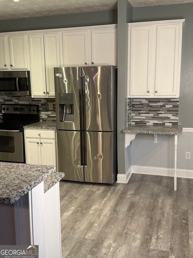 Building Photo - 1221 River Rush Ln NE