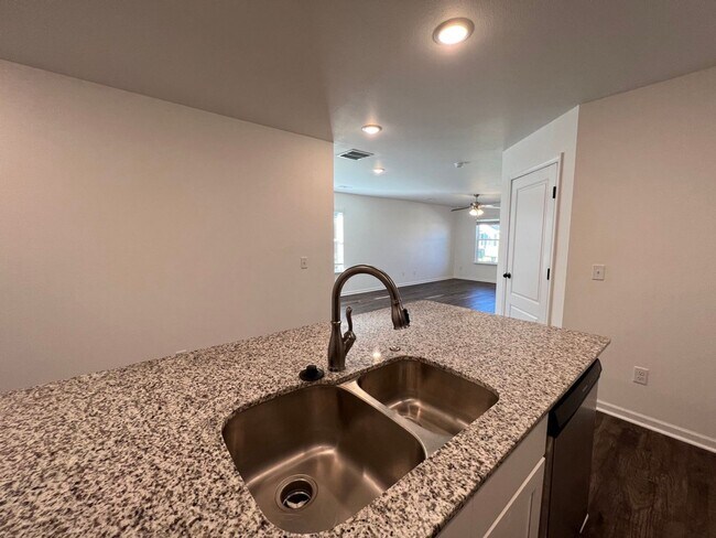 Building Photo - New 3 Bedroom Townhome ($999 Per Month)