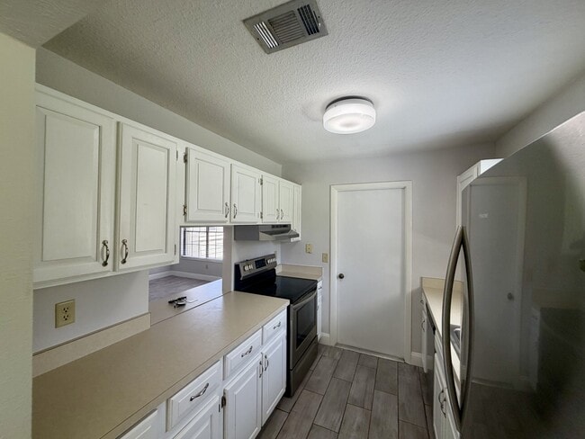 Building Photo - 1590 SE Dewberry Ct