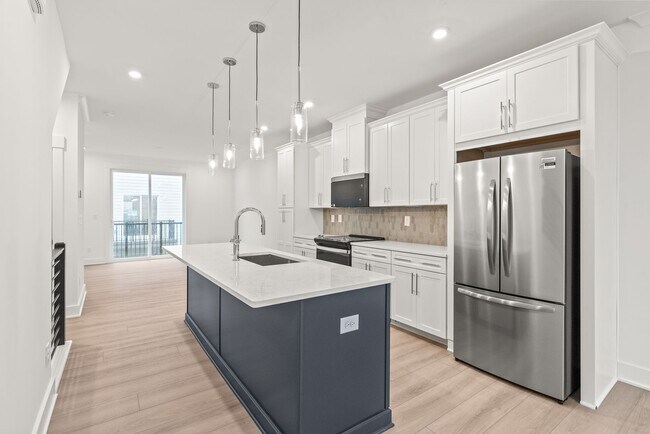 Building Photo - (Move-in Special) 3 Bedroom Townhome in LoSo!