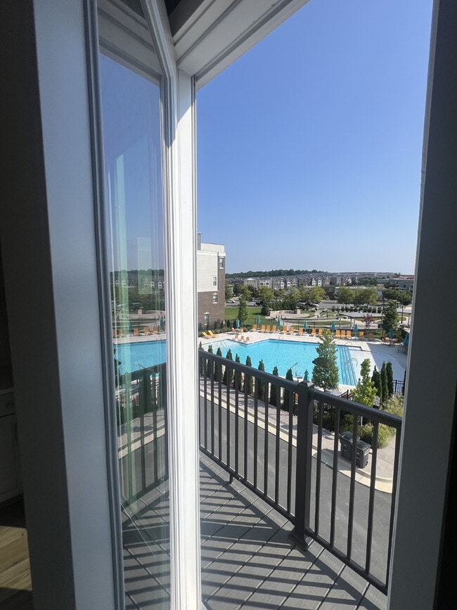 Building Photo - Brand-New Luxury 3BR Townhome-Style Condo ...