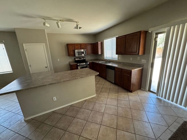 Building Photo - 4 Bedroom - 2.5 Bath - 2310 Sq Ft
