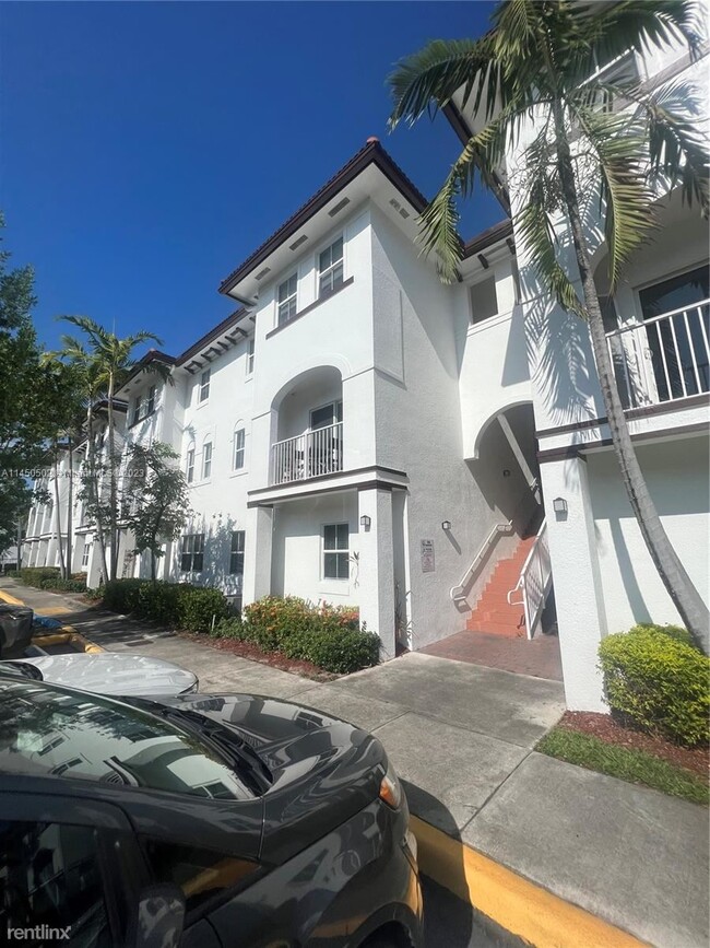 Building Photo - 3 br, 2.5 bath Condo - 8800 NW 97th Ave Ap...