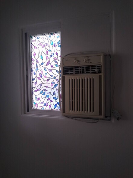 Bedroom has wall A/C unit too. - 4127 Everts St