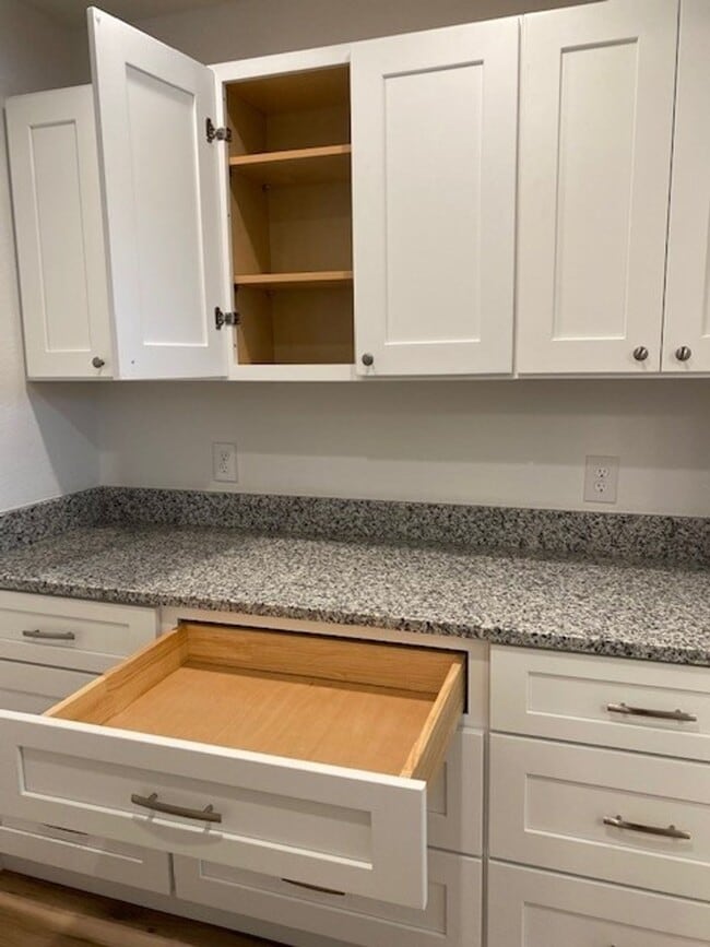 Building Photo - RENT BY THE ROOM - 1/2 or Whole Home!