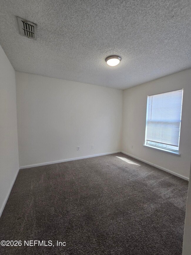 Building Photo - 7910 Georgia Jack Dr N