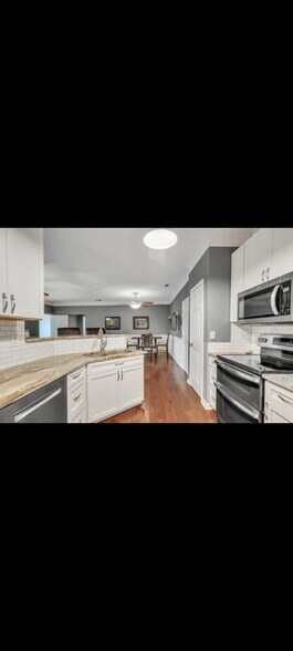 Stone tops - 1443 Cambridge Lakes Dr