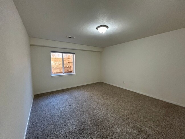 Building Photo - Stylish, Spacious 3 Bedroom Townhome with Two-Car Garage