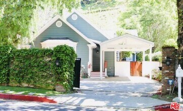 Building Photo - 818 N Beverly Glen Blvd