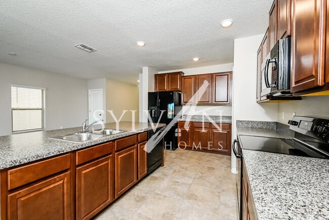 Building Photo - It’s time to start living the Real Life!