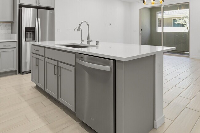 Building Photo - Experience refined living in this beautifully appointed 3-bedroom, 2.5-bathroom townhome spanning...