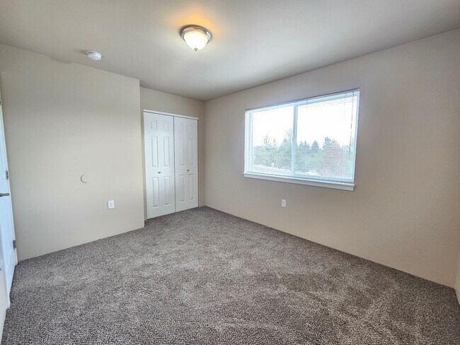 Building Photo - 5207-5207 E Upriver Dr