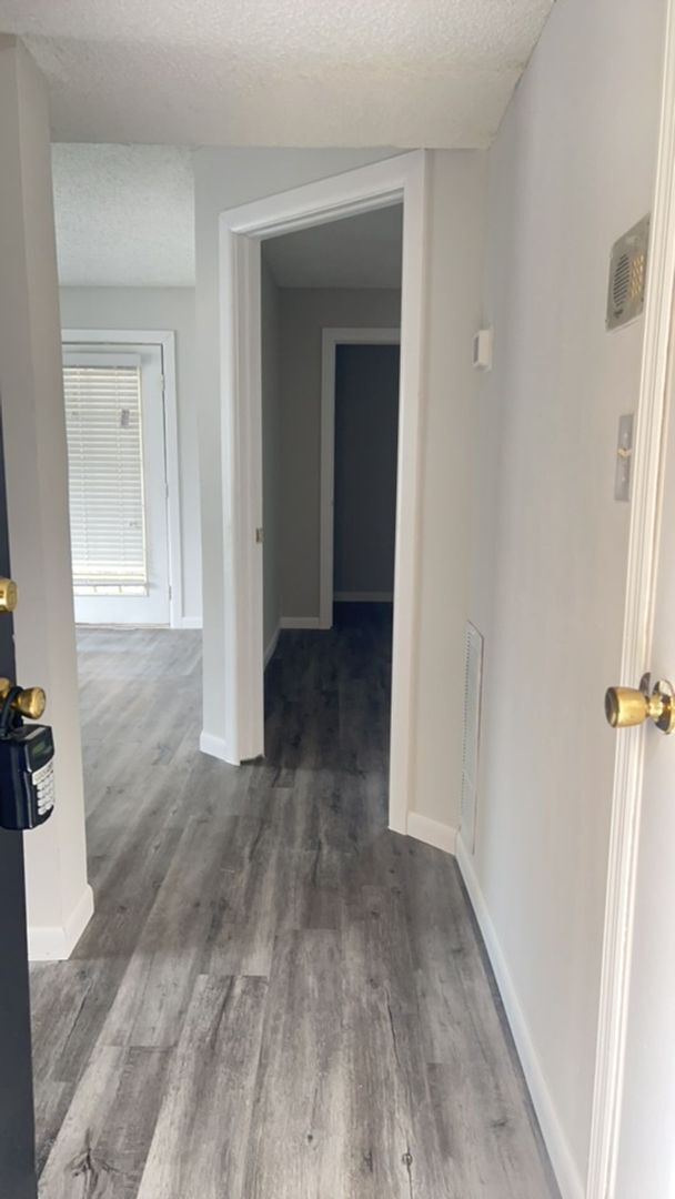 Building Photo - For Rent: 1 Bedroom, 1 Bath in a gated com...