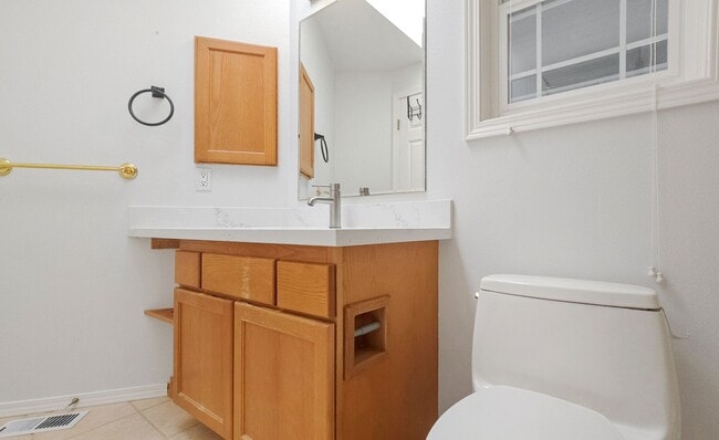 Building Photo - Spacious Updated 4 Bedroom Home with 3 Car Garage