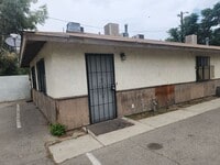 Building Photo - Enjoy this 2 bed/1 bath apartment - coming...