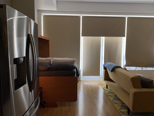 Room darkening blinds - 350 W Ash St