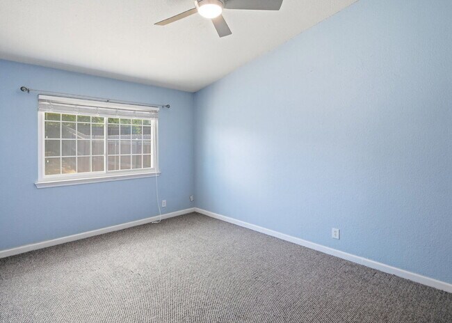 Building Photo - Corner-Lot Garden Home with a Private Patio.