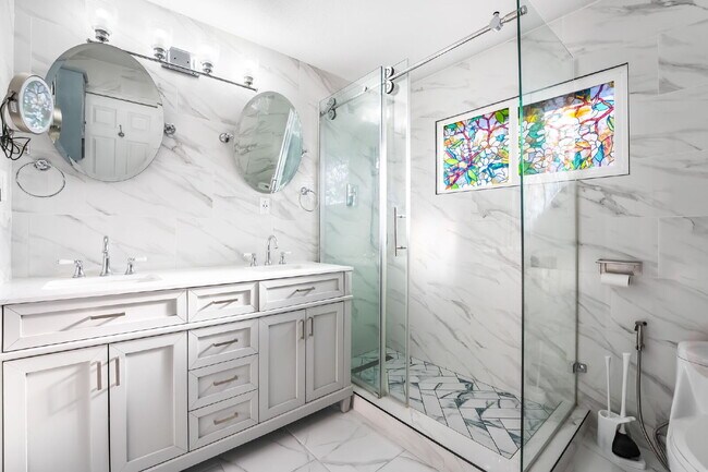 Building Photo - Single Story,  Totally Renovated , 3 bedroom, 2 bathroom Home with  extensive privacy and gated h...